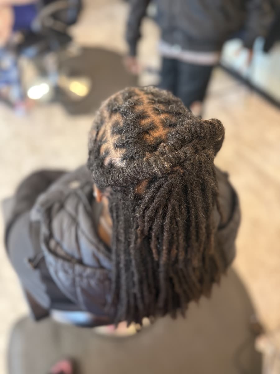 Natural hanging locs, top-down back view