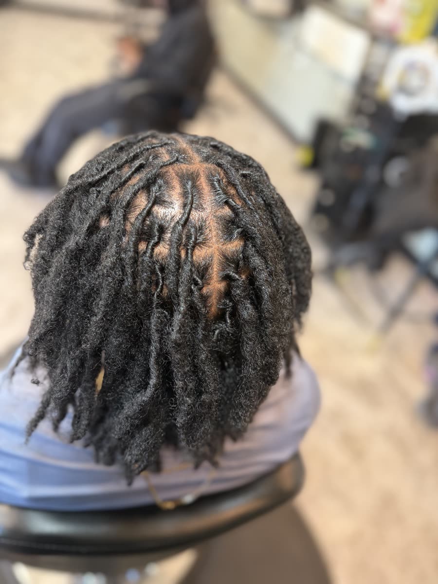 Pineapple updo loc style, side view