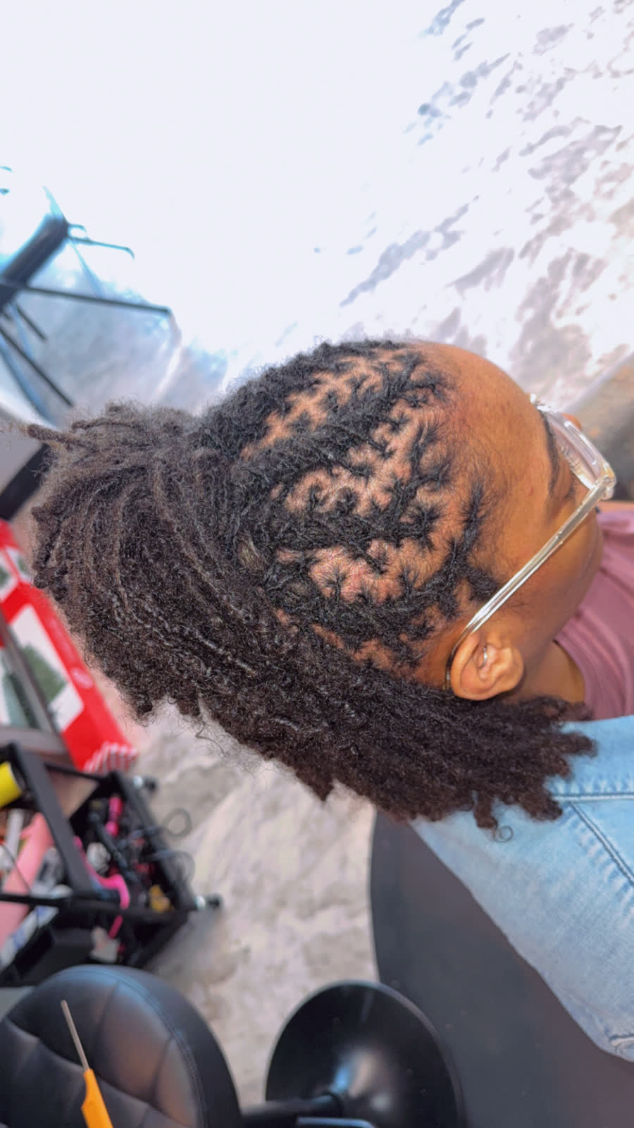 Micro locs, side profile with glasses